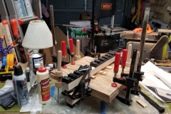 Gluing the thin top pieces together.