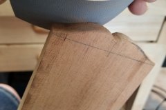 Using "Shark-Skin" abrasive to shape the headstock.