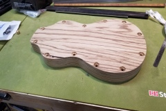 The bottom with countersunk bolt holes.