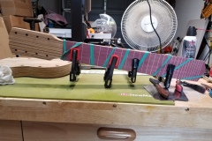 Final gluing of the fingerboard to the neck.