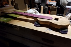 The pickup hole is routed and control holes drilled and countersunk.